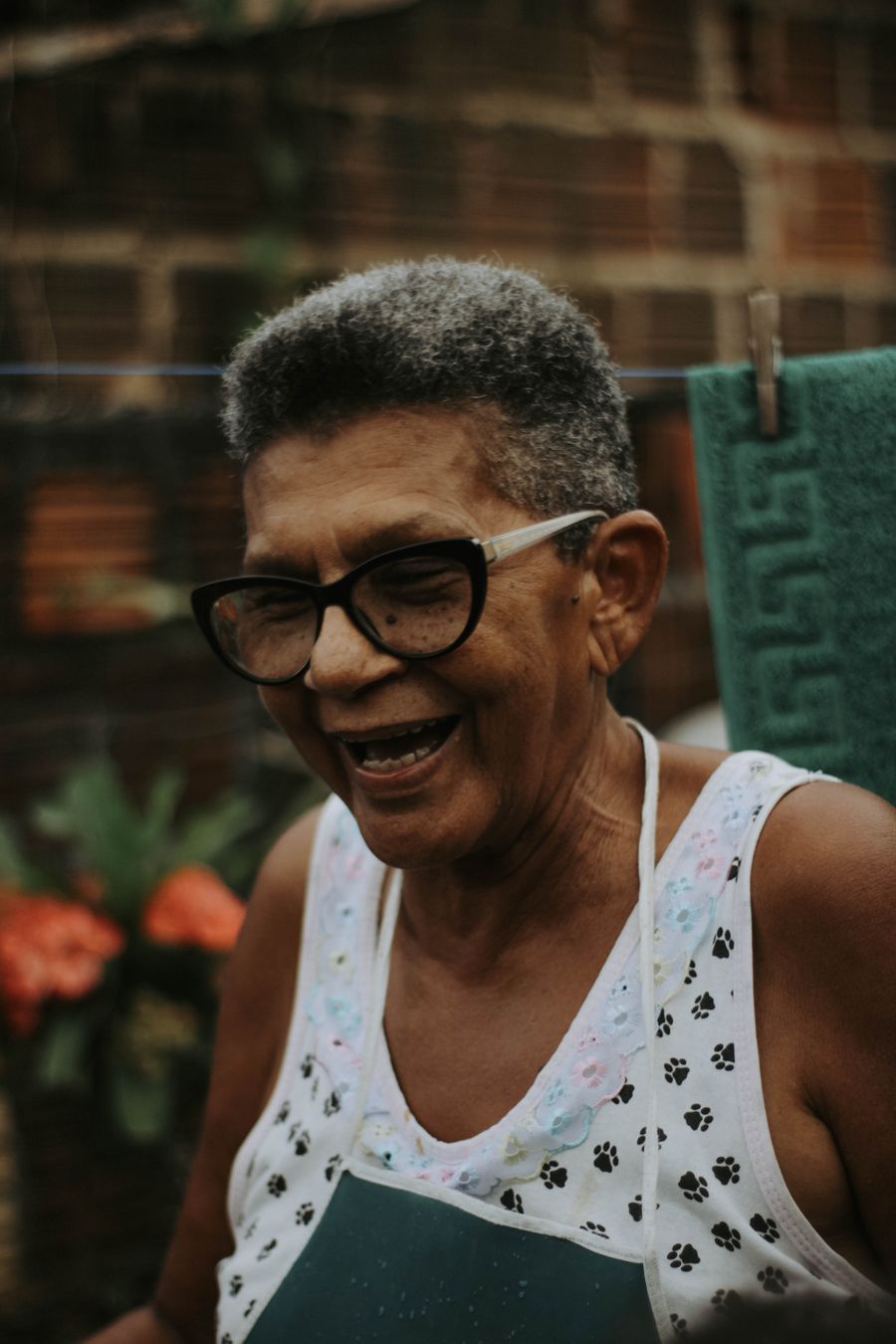 A parent laughing mid-story